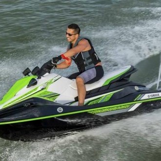 a man riding a wave on a surfboard in the water