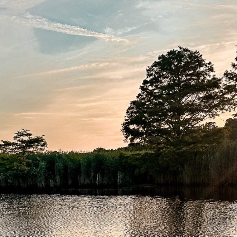 a sunset over a body of water
