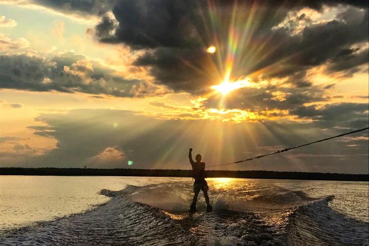 a sunset over a body of water