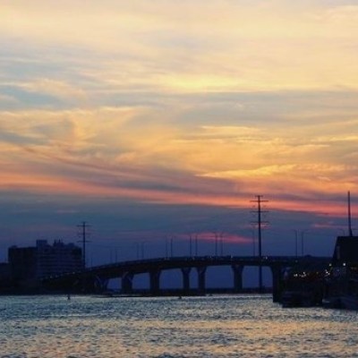 a sunset over a body of water