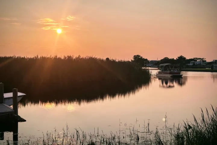 a sunset over a body of water